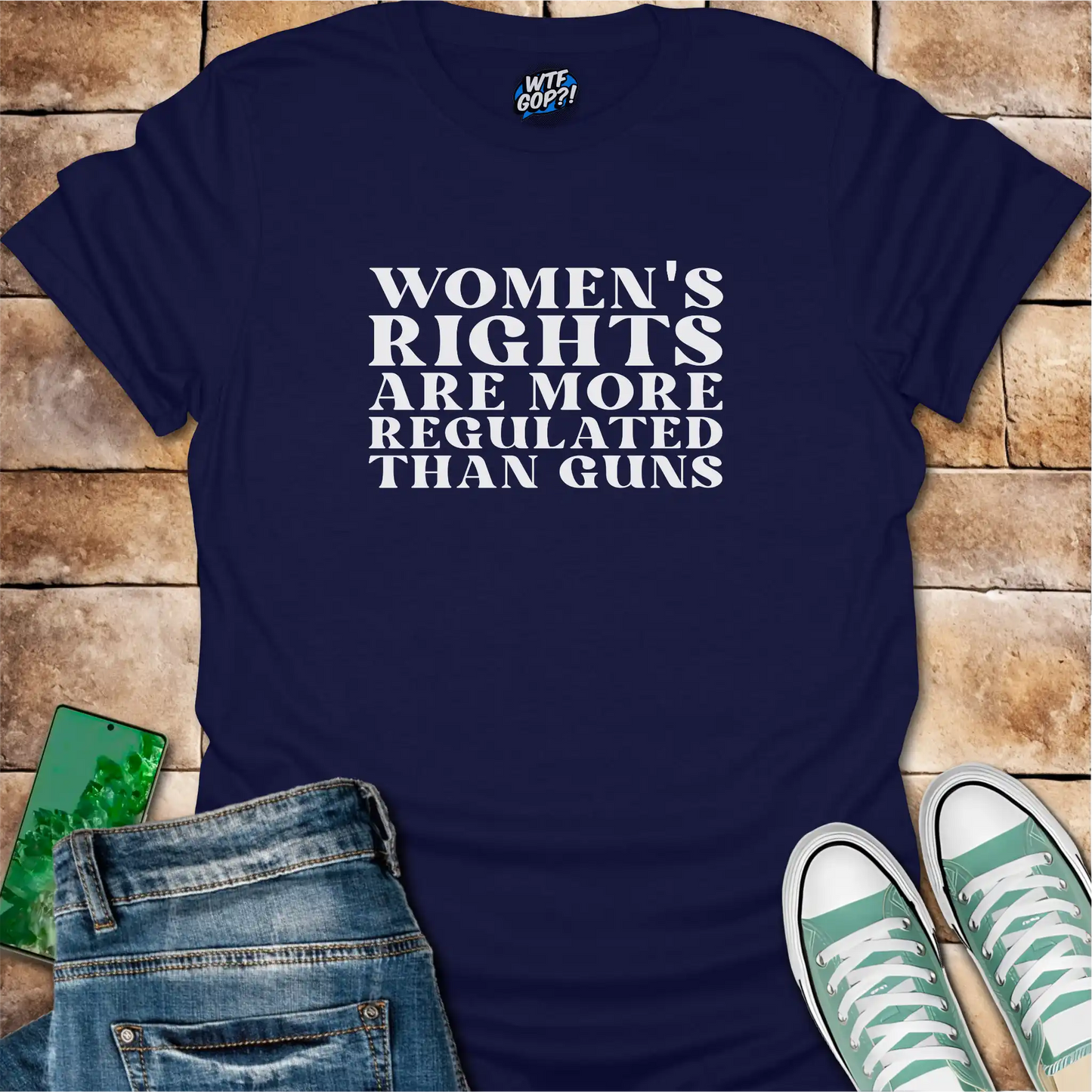Navy Blue Women More Regulated Than Guns t-shirt with bold political statement text