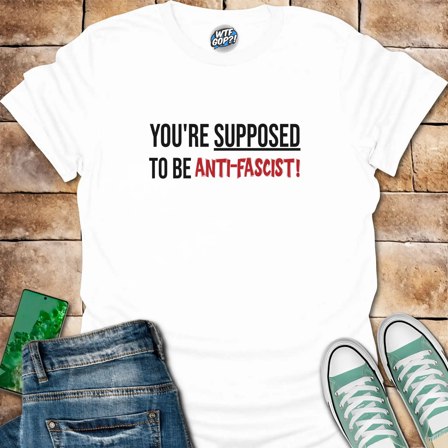 White Anti-Fascist T-Shirt: The phrase 'You're Supposed To Be Anti-Fascist!' in bold letters.