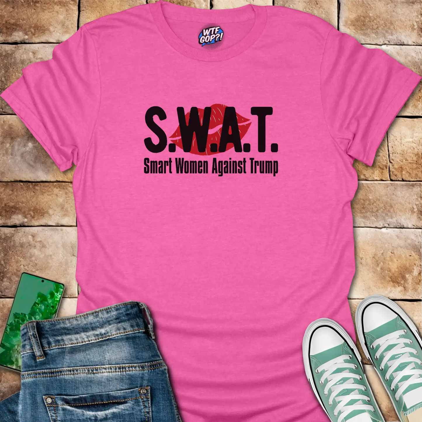 Pink SWAT Anti-Trump Shirt: The acronym 'SWAT' with the full phrase 'Smart Women Against Trump' below.