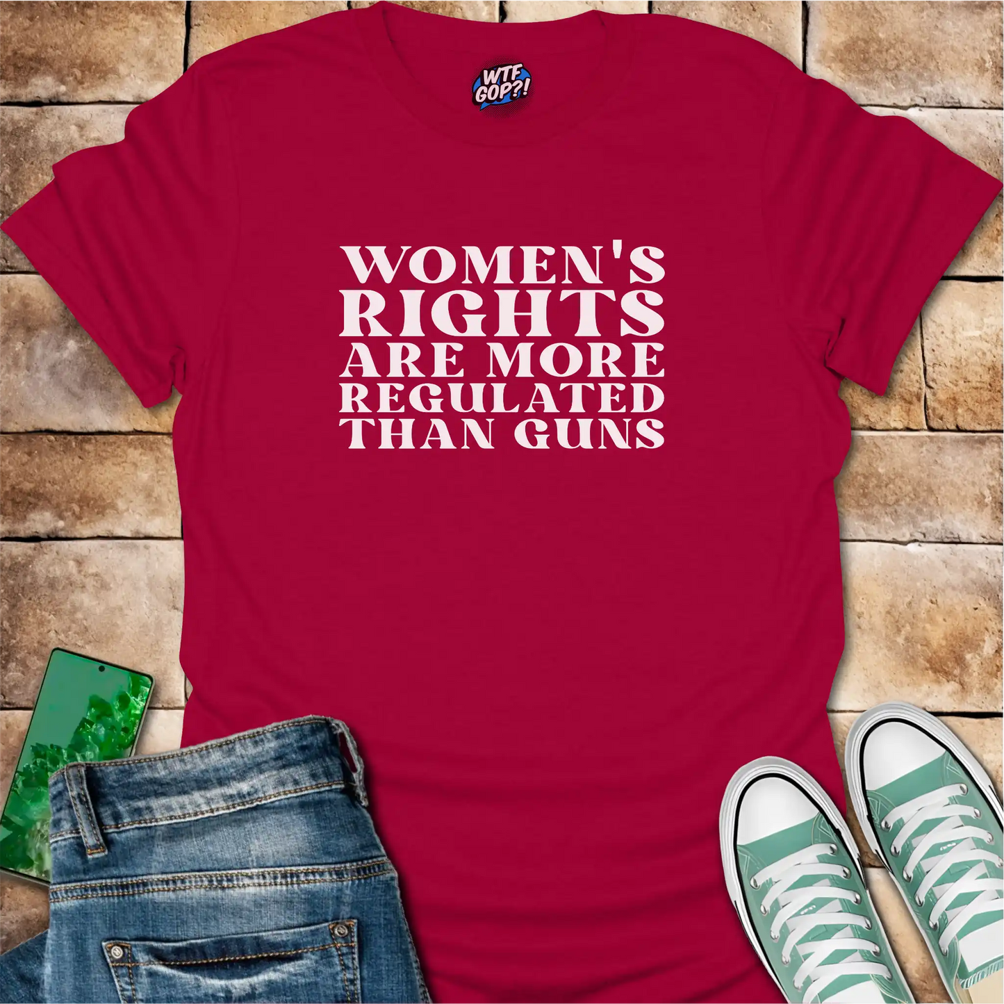 Cherry Red Women More Regulated Than Guns t-shirt with bold political statement text