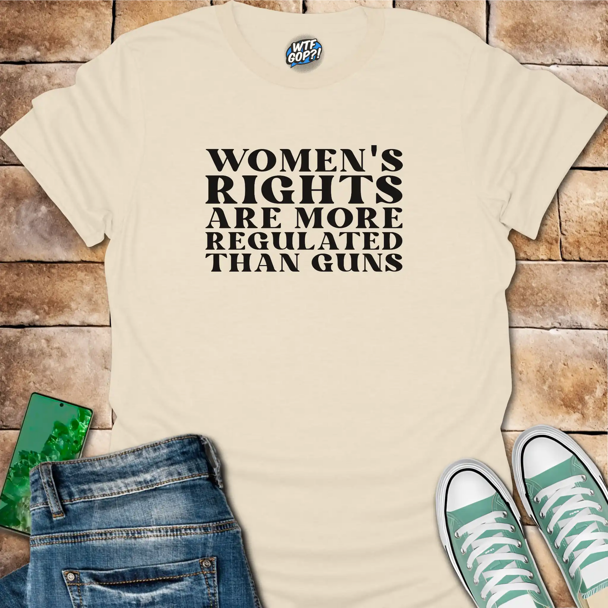 Natural Women More Regulated Than Guns t-shirt with bold political statement text