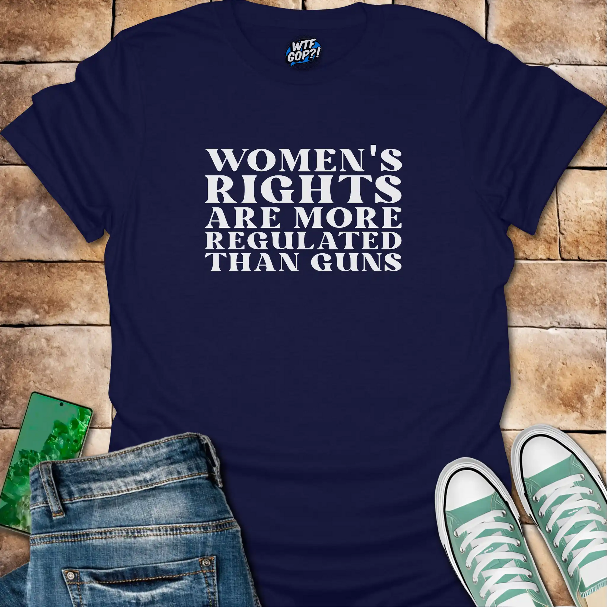 Navy Blue Women More Regulated Than Guns t-shirt with bold political statement text