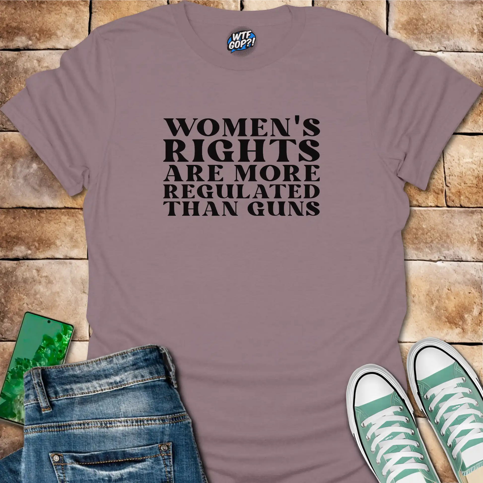 Paragon Women More Regulated Than Guns t-shirt with bold political statement text