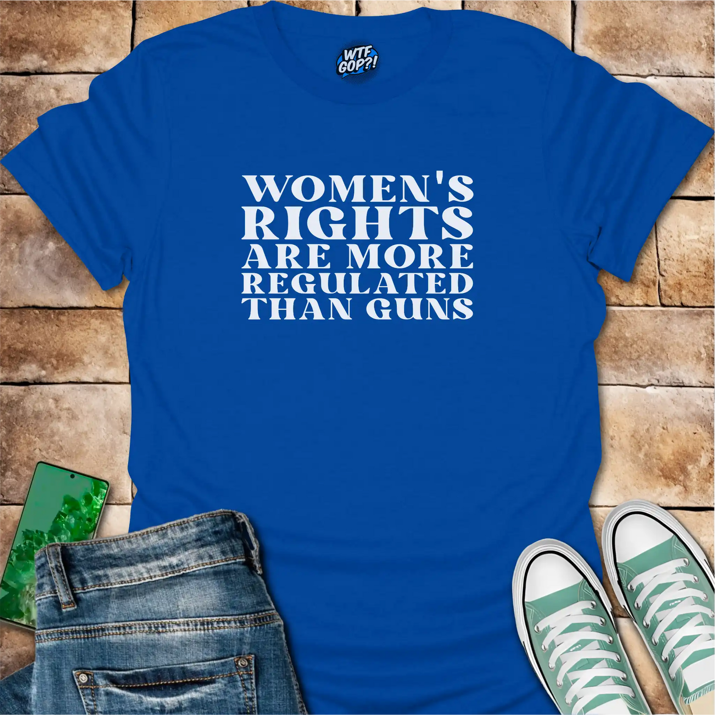 Royal Blue Women More Regulated Than Guns t-shirt with bold political statement text