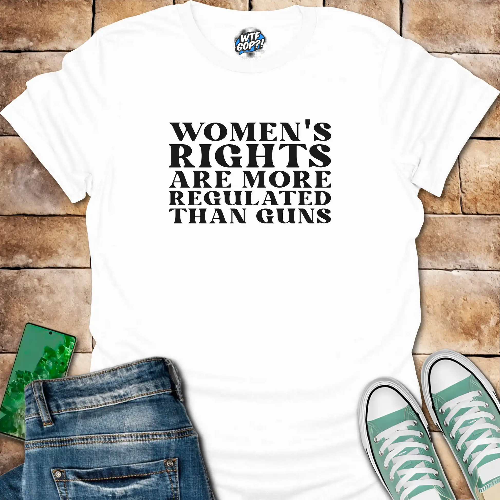 White Women More Regulated Than Guns t-shirt with bold political statement text