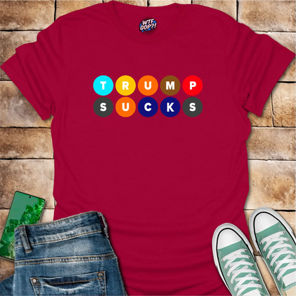 Cherry Red Trump Sucks NYC Subway t-shirt with colorful MTA-inspired circle design
