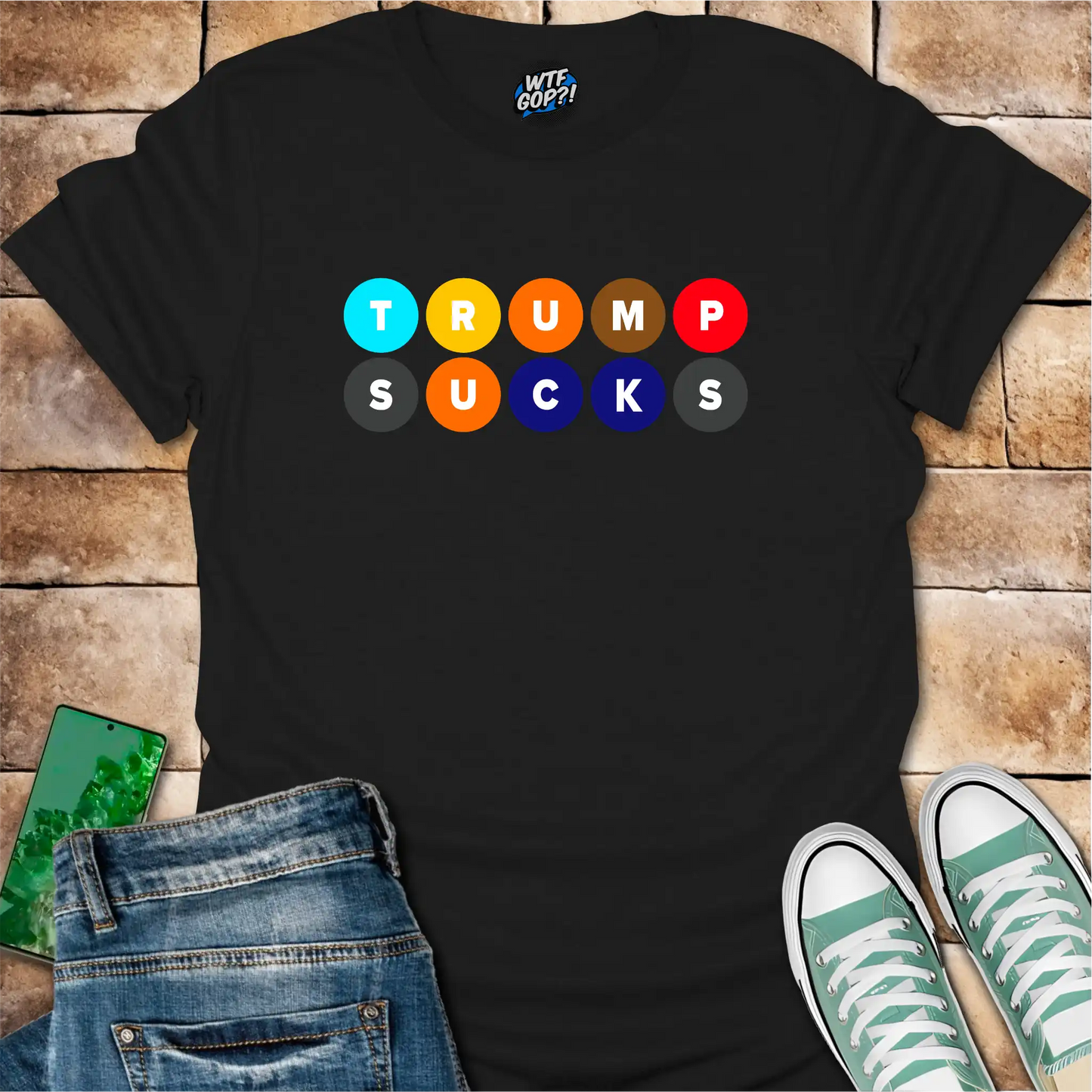 Black Trump Sucks NYC Subway t-shirt with colorful MTA-inspired circle design