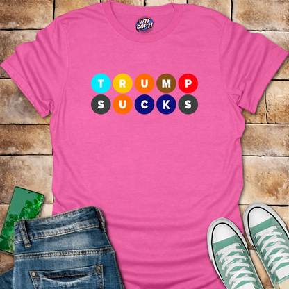 Pink Trump Sucks NYC Subway t-shirt with colorful MTA-inspired circle design