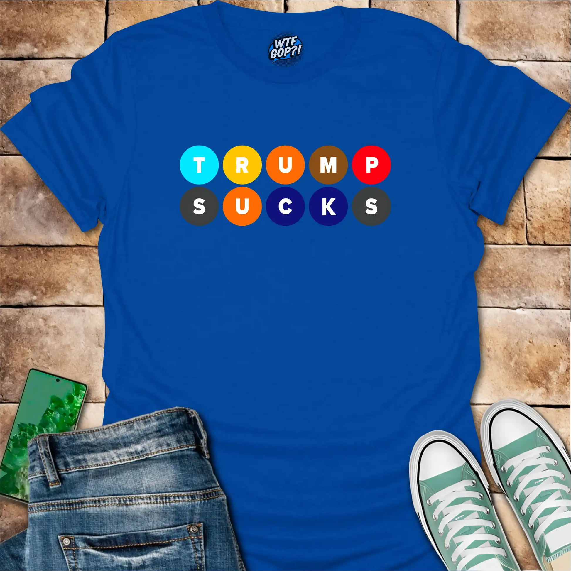Royal Blue Trump Sucks NYC Subway t-shirt with colorful MTA-inspired circle design