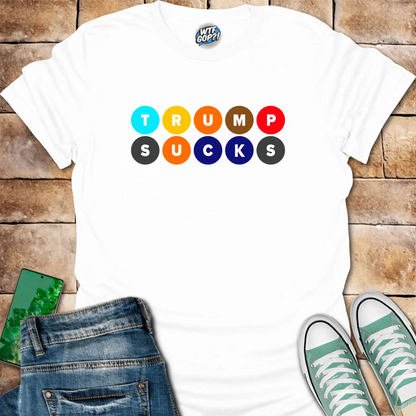 White Trump Sucks NYC Subway t-shirt with colorful MTA-inspired circle design