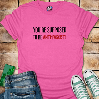 Pink Anti-Fascist T-Shirt: The phrase 'You're Supposed To Be Anti-Fascist!' in bold letters.